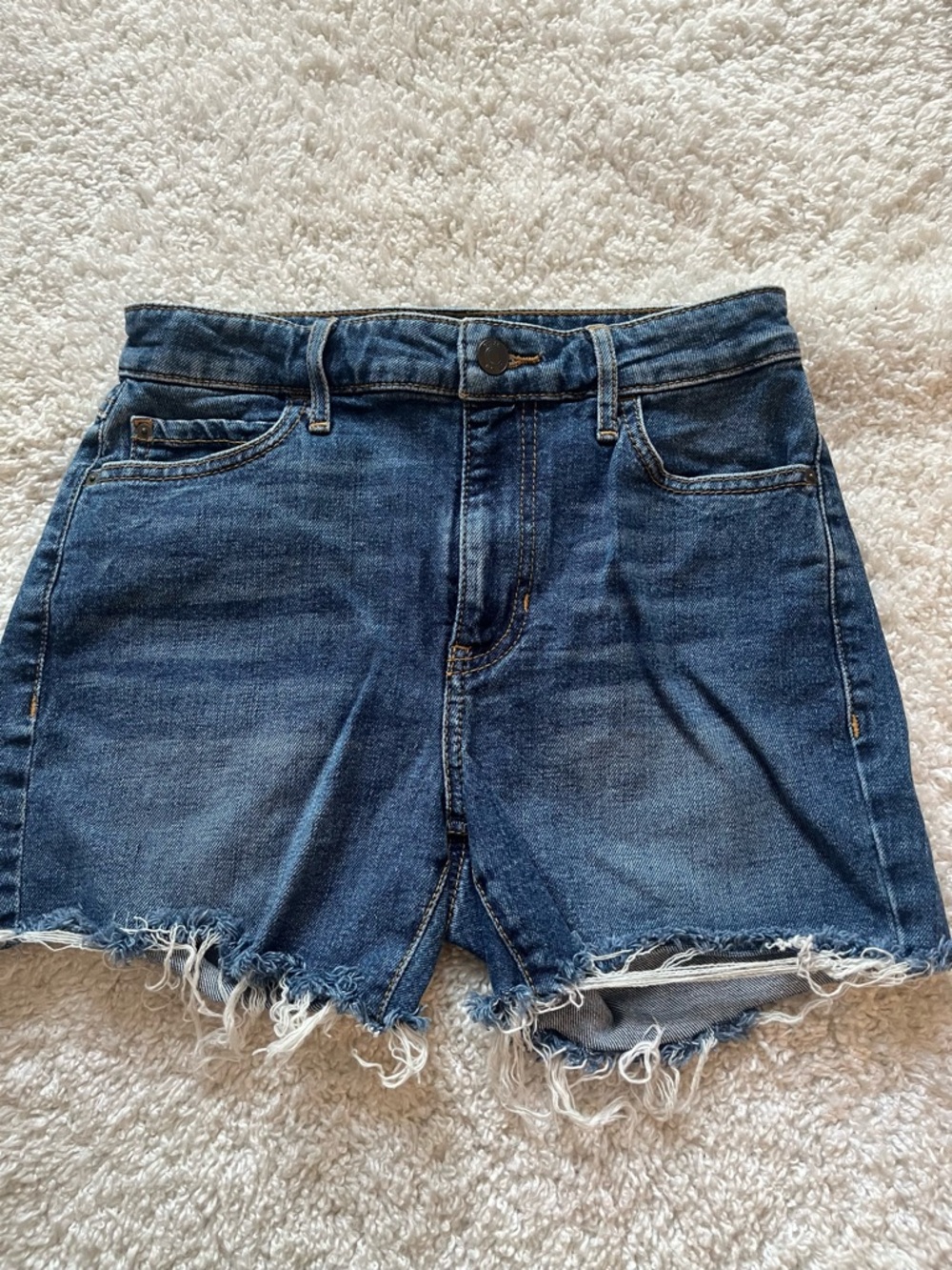 GUESS medium wash distressed shorts